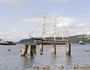 The SV Glenlee is towed back to its Clyde moorings