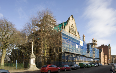 Scaffolding covers the Pearce Institute