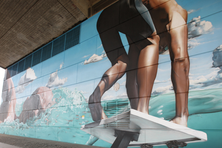 Commonwealth Games mural under the Kingston Bridge by artist Sam Bates