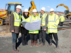 On site at Clydebank East: Gil Paterson local MSP, Debbie McNamara, chief executive officer Hub West Scotland, Mike Burrows, managing director Fleming Buildings, Graham Mochan, chairperson Clydebank Re-built and Adrian Brown, project manager Scottish Enterprise
